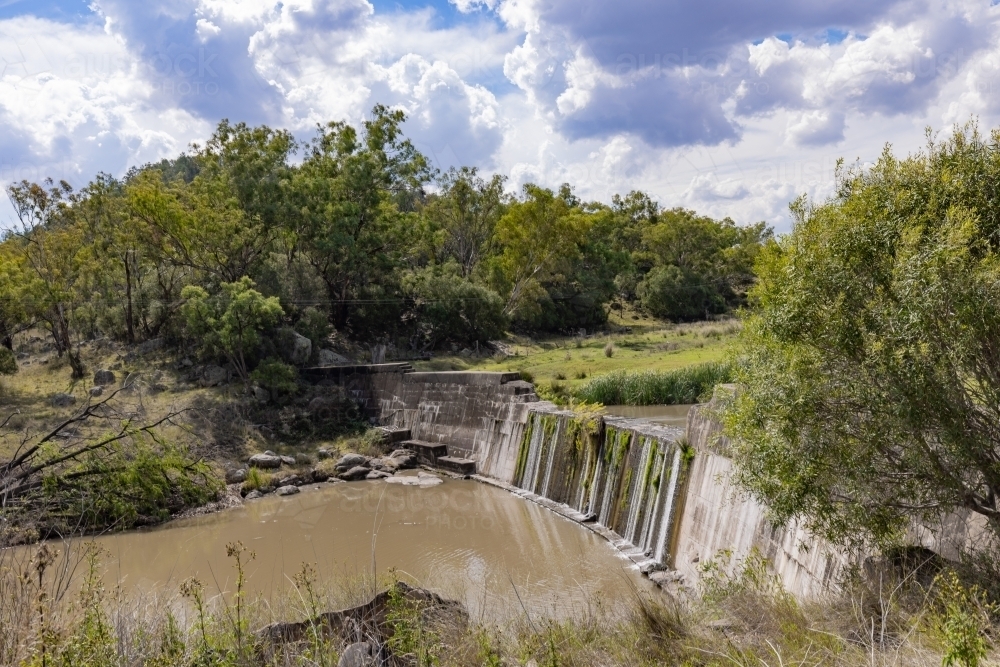 Water cascading over spillway in the Liverpool Plains NSW - Australian Stock Image