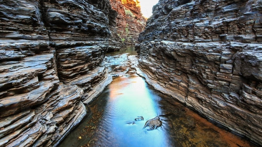 Water flowing through rocky gorge - Australian Stock Image