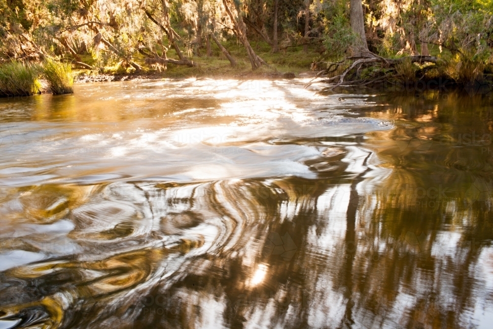 Water ripples in a river - Australian Stock Image