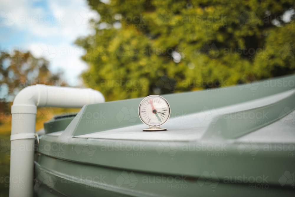 Water tank level indicator, rain harvesting tank gauge on rural property - Australian Stock Image