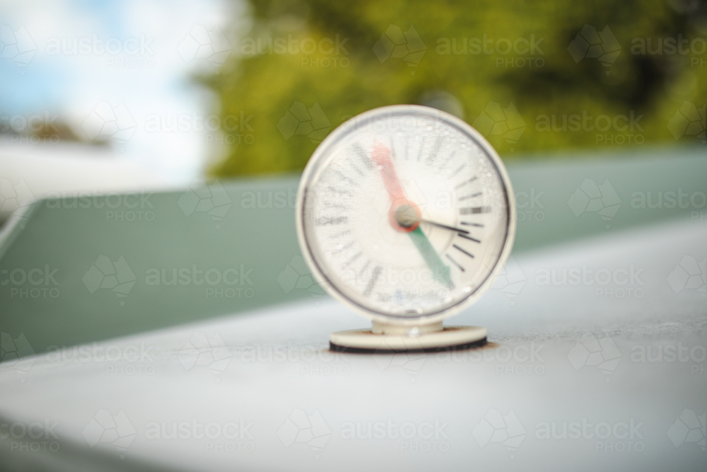 Water tank level indicator, rain harvesting tank gauge on rural property - Australian Stock Image