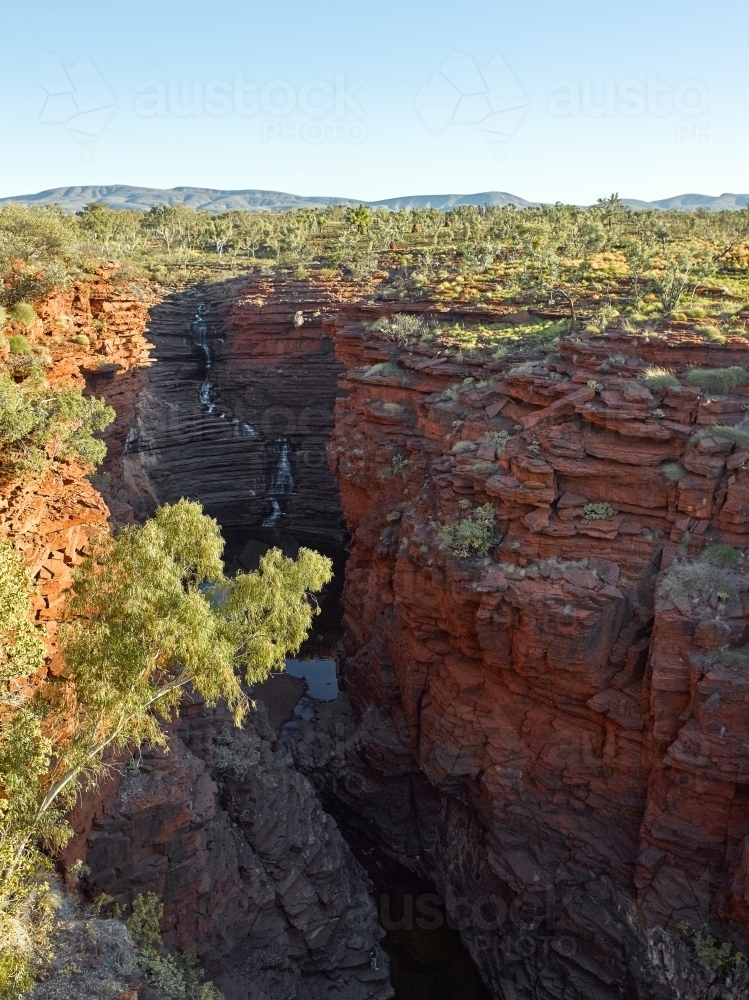 Waterfall and gorge in remote location - Australian Stock Image