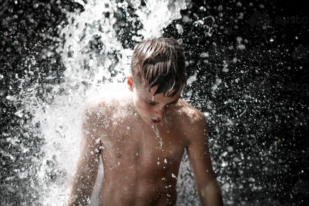 Waterfall boy - Australian Stock Image