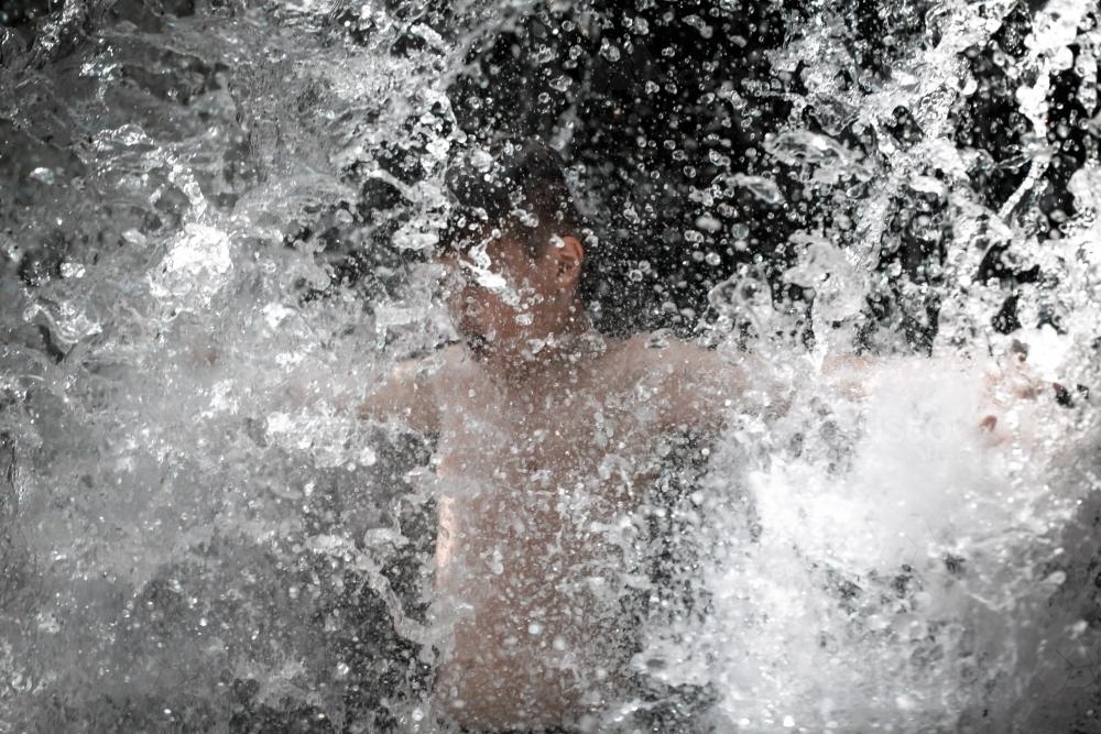 Waterfall boy - Australian Stock Image