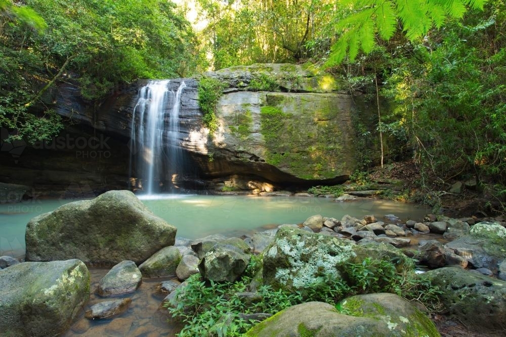 Waterfall in rocky gorge - Australian Stock Image