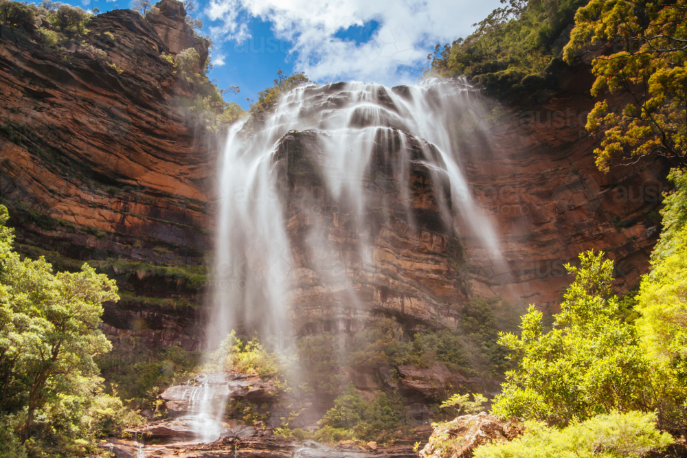 Waterfalls cascading over rocks in Wentworth Falls, New South Wales, Australia - Australian Stock Image