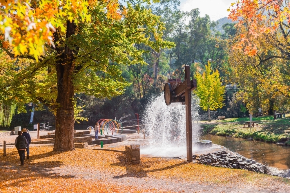 waterpark in Bright, Vic, with autumn leaves - Australian Stock Image