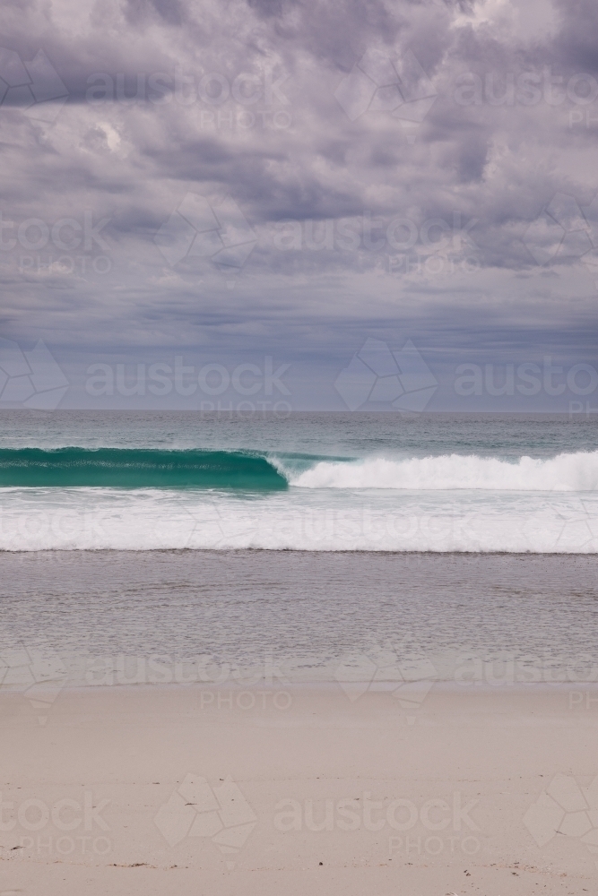 Wave breaking at 10 Mile Lagoon - Australian Stock Image
