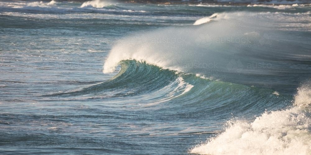 wave breaking at the beach - Australian Stock Image