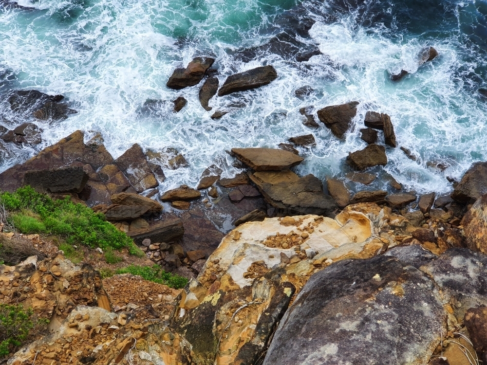 Waves crashing on rocks - Australian Stock Image