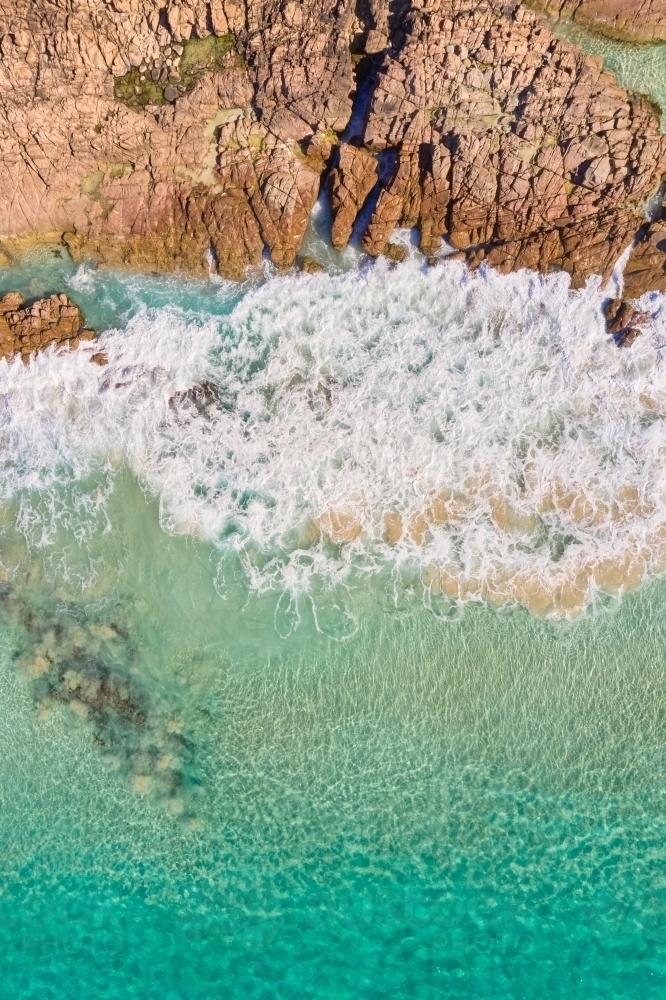 Waves crashing onto rocks at Bunker Bay, near Dunsborough, Western Australia - Australian Stock Image