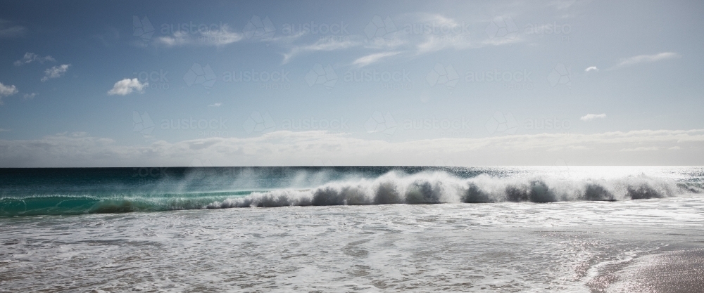 Waves in morning light - Australian Stock Image