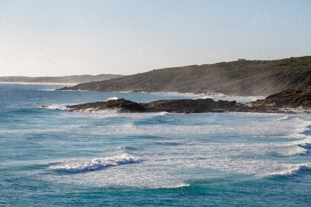 Waves rolling in at Native Dog Beach - Australian Stock Image