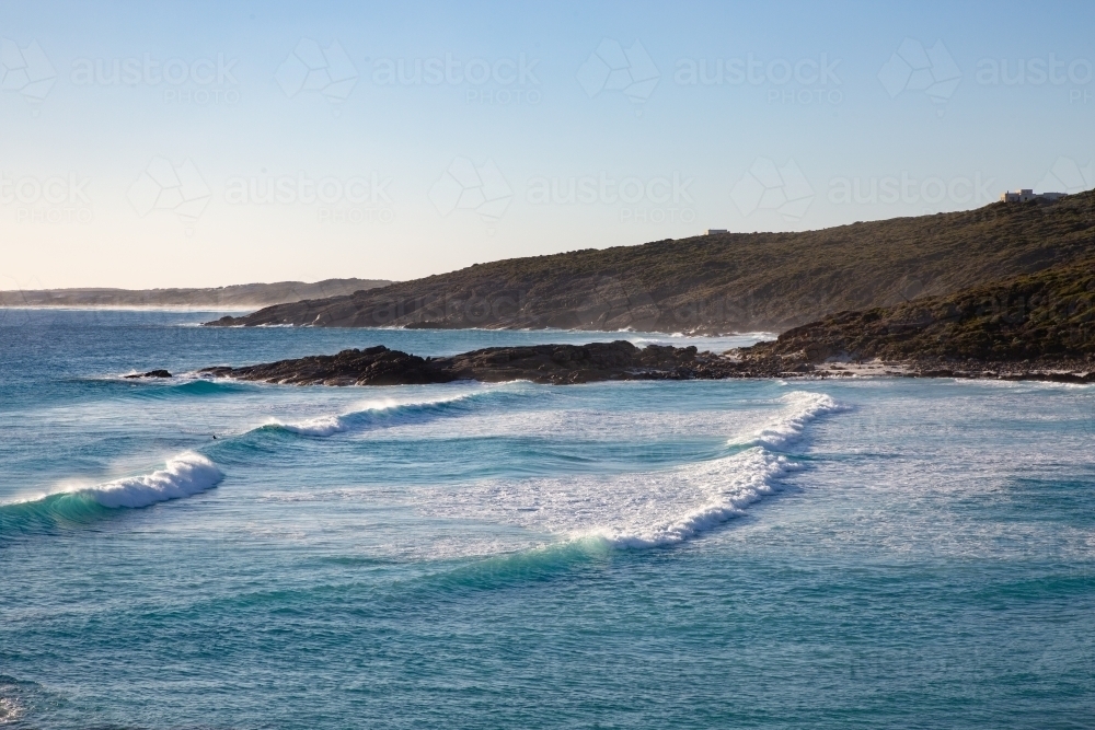 Waves rolling in at Native Dog Beach - Australian Stock Image