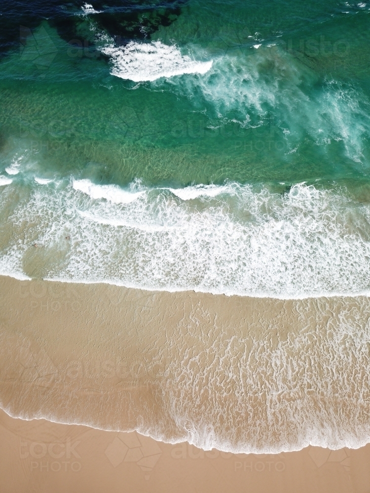 Waves rolling in at Yamba, NSW - Australian Stock Image