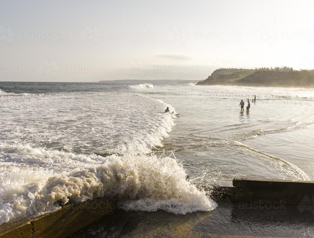 Wavesd crashing onto Newcastle Ocean Baths 09 - Australian Stock Image