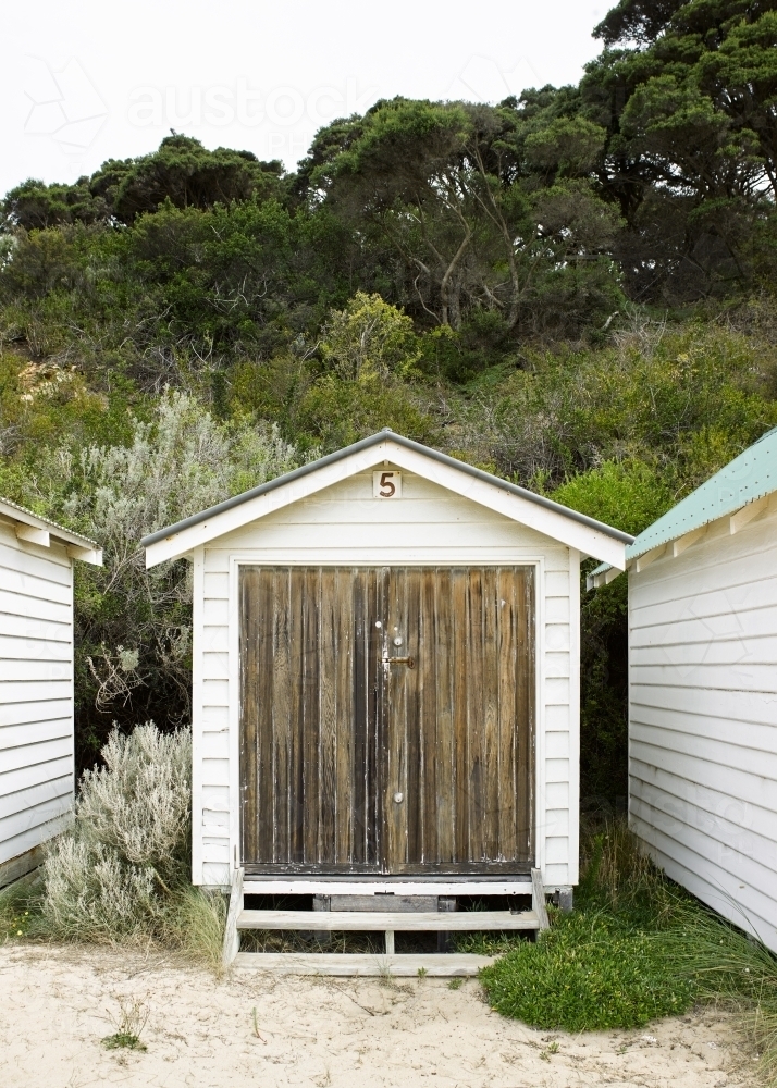 Weathered beach box at a swimming beach - Australian Stock Image