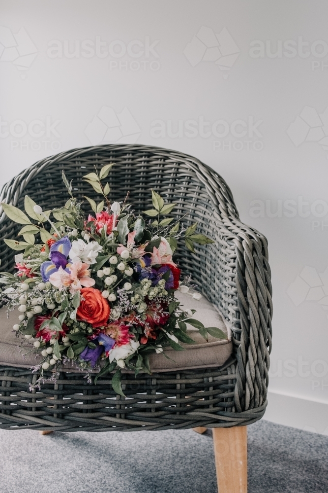 wedding bouquet on a chair. - Australian Stock Image