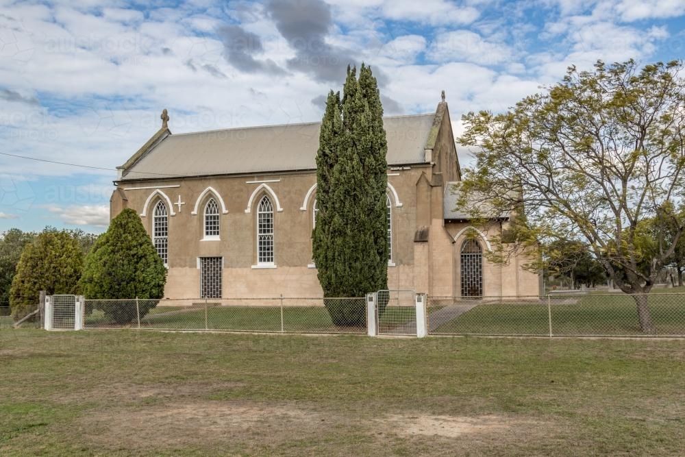 Camberwell church set within a rural landscape, showing simple architecture - Australian Stock Image