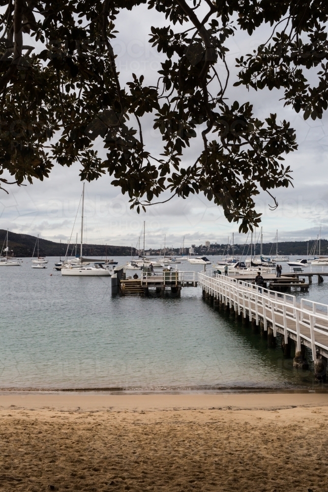 wharf and boats scene at balmoral beach - Australian Stock Image