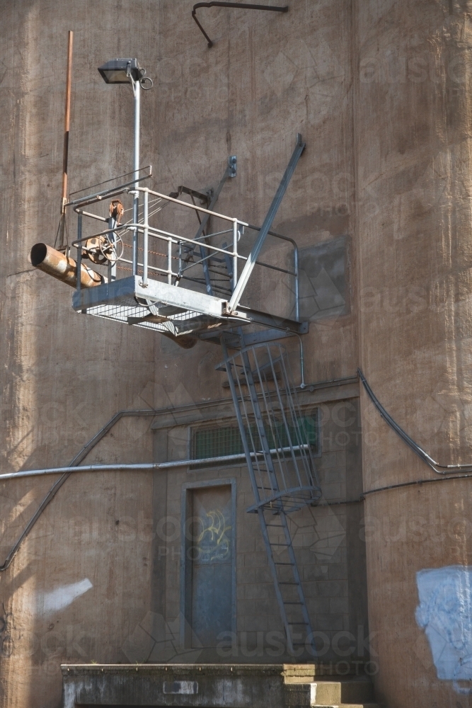 Wheat silo grain chute for loading grains onto train - Australian Stock Image