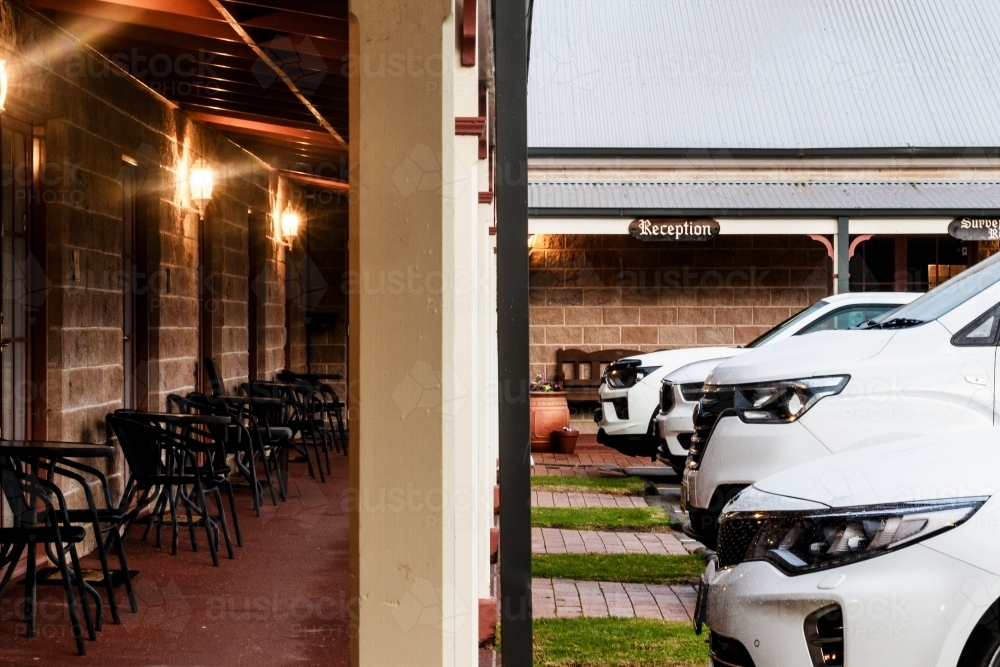 White cars parked outside the restaurant - Australian Stock Image