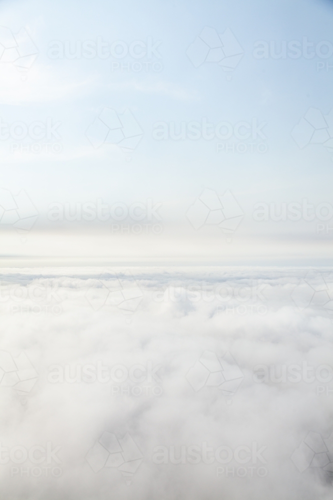 White clouds filling sky seen from above - Australian Stock Image