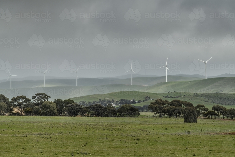Wind turbines during rainy weather - Australian Stock Image