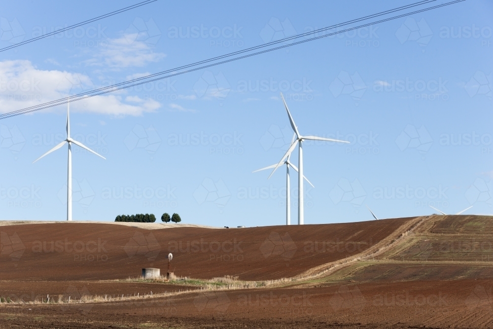 Wind turbines in tilled paddocks - Australian Stock Image