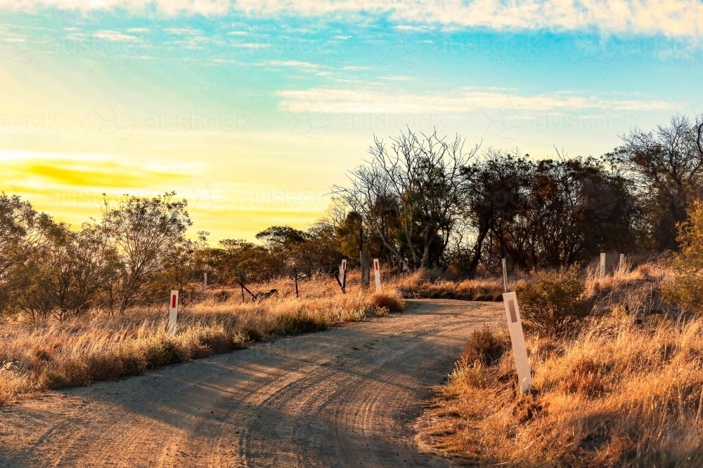 Winding dirt road in rural countryside - Australian Stock Image