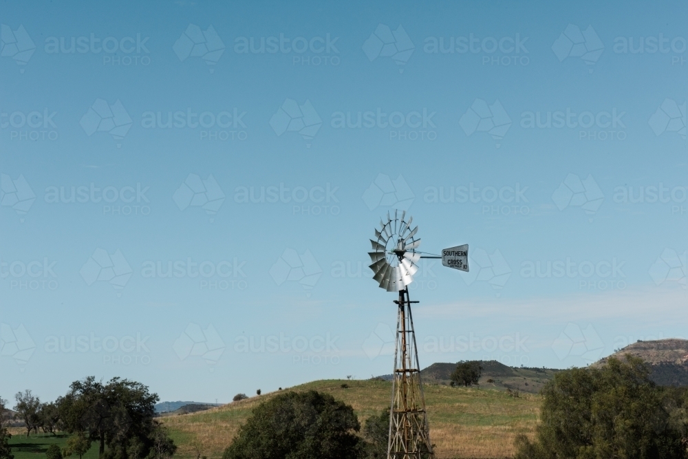 Windmill and big blue sky - Australian Stock Image
