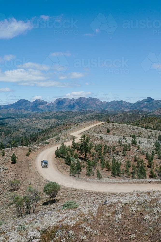 Windy dirt road leading through the Flinders Ranges - Australian Stock Image