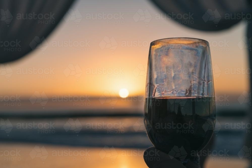 wine glass at sunset - Australian Stock Image
