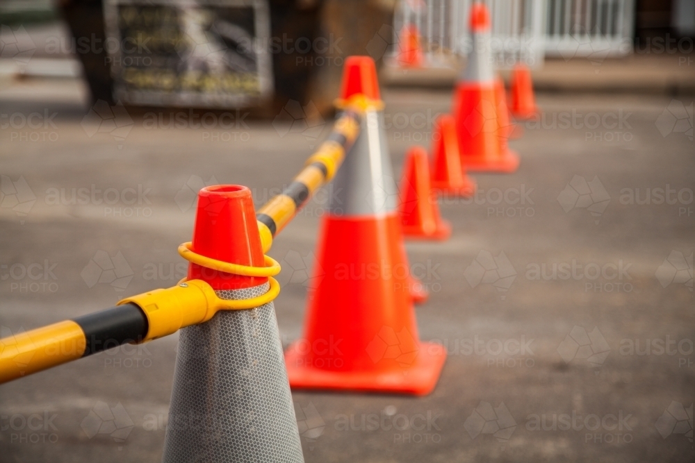 Witches hats blocking of car parks in construction zone - Australian Stock Image