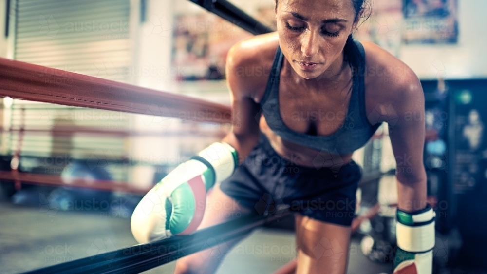 Woman boxing training at gym - Australian Stock Image