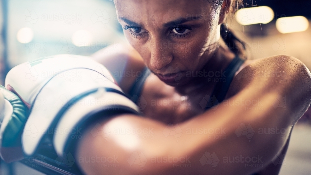 Woman boxing training at gym - Australian Stock Image