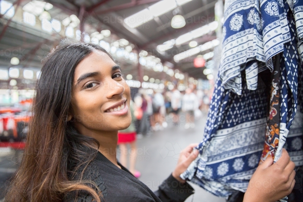 Woman happily shopping at Queen Victoria Market : Austockphoto Woman happily shopping at Queen Victoria Market - Australian Stock Image