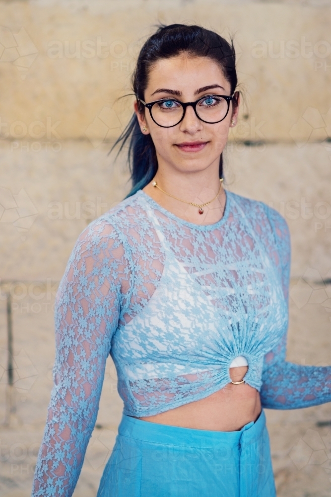 woman in blue outfit - Australian Stock Image