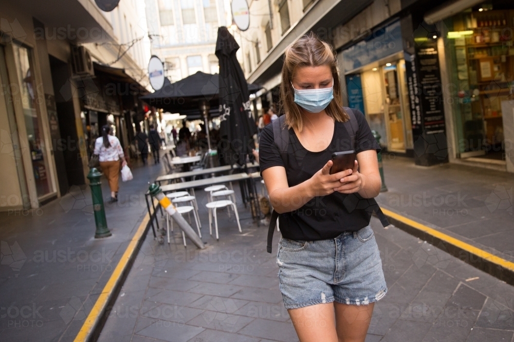 Woman in Mask Exploring Melbourne - Australian Stock Image