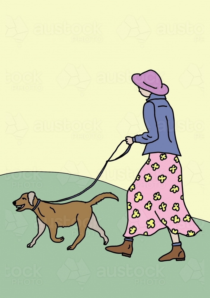 Woman in pink floral skirt, blue jacket, purple hat walking brown dog up green hill yellow sky - Australian Stock Image