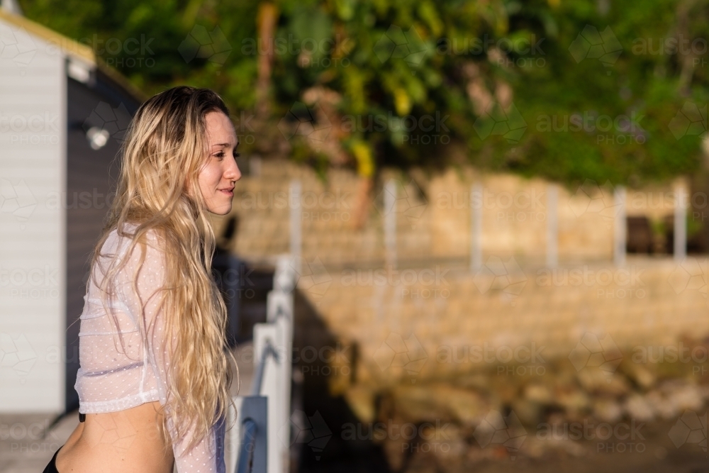woman looking out to sea - Australian Stock Image