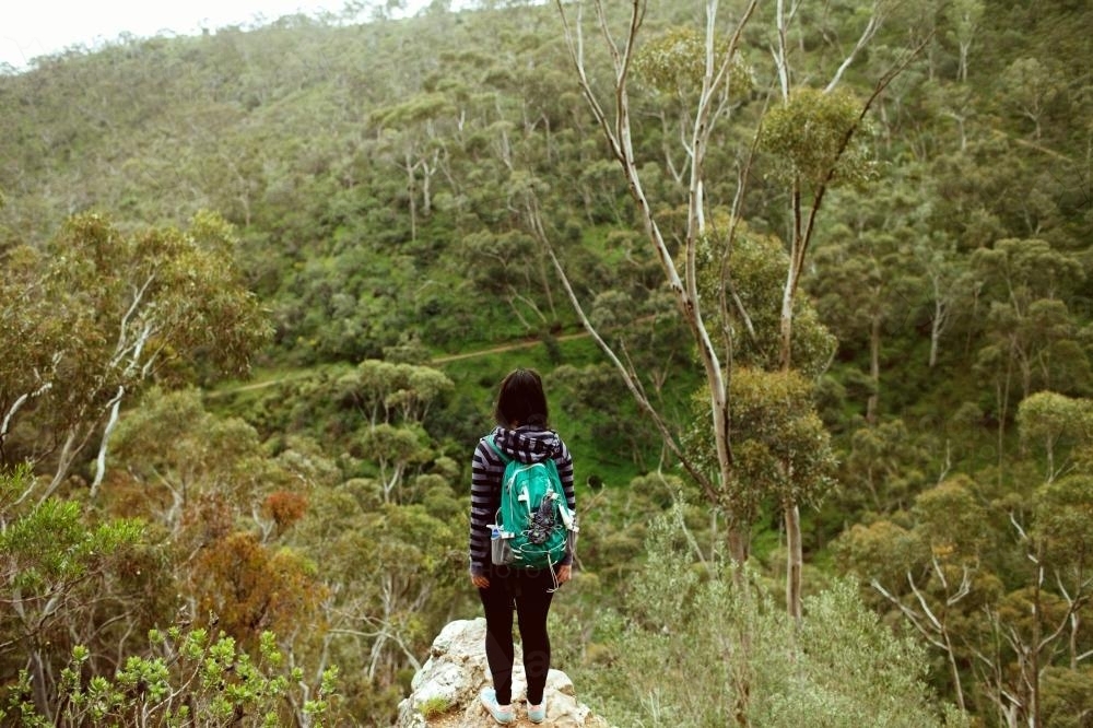 Woman standing on a mountain - Australian Stock Image