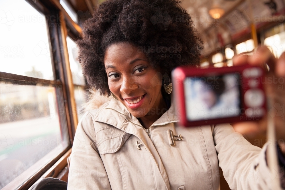 Woman Taking Selfie on Tram - Australian Stock Image