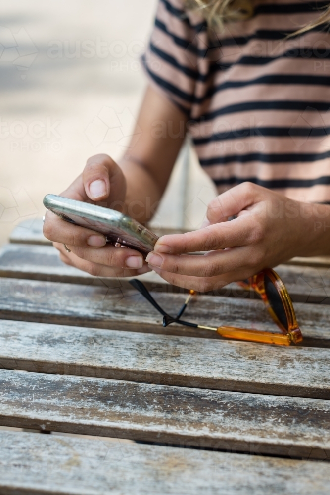 woman using mobile phone - Australian Stock Image