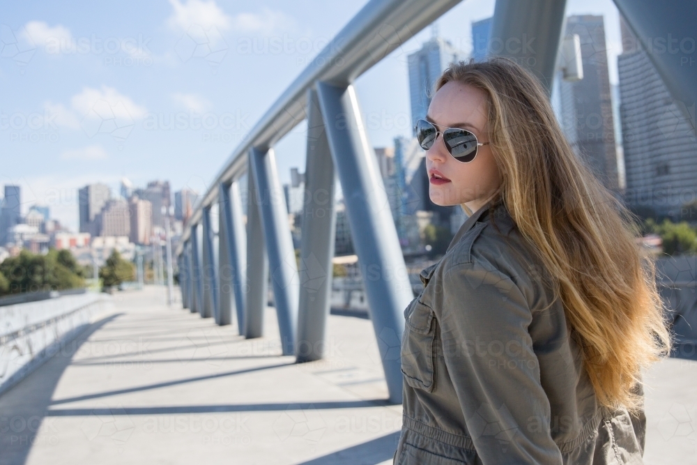 Woman Walking From MCG to Melbourne City - Australian Stock Image