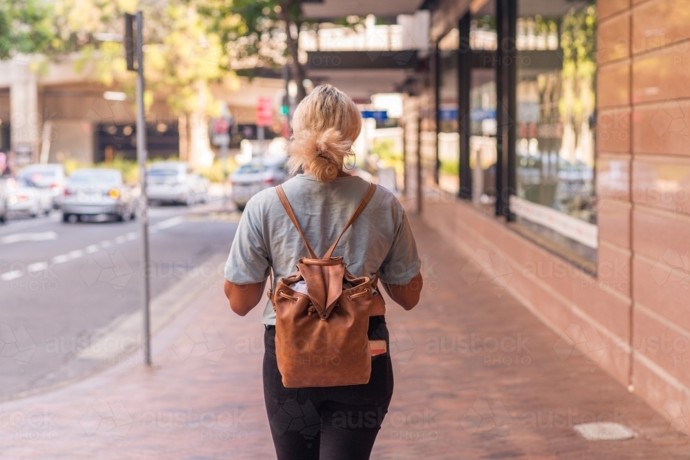 woman walking in the city - Australian Stock Image