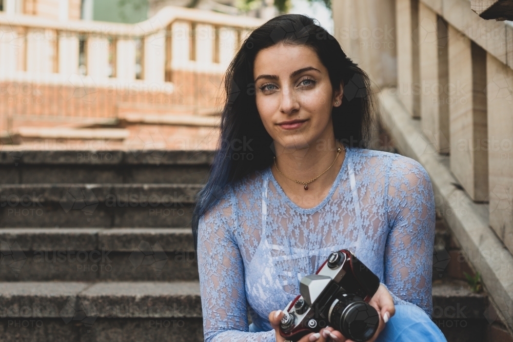 woman with camera - Australian Stock Image