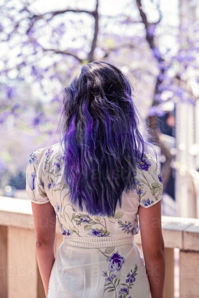 woman with purple hair - Australian Stock Image