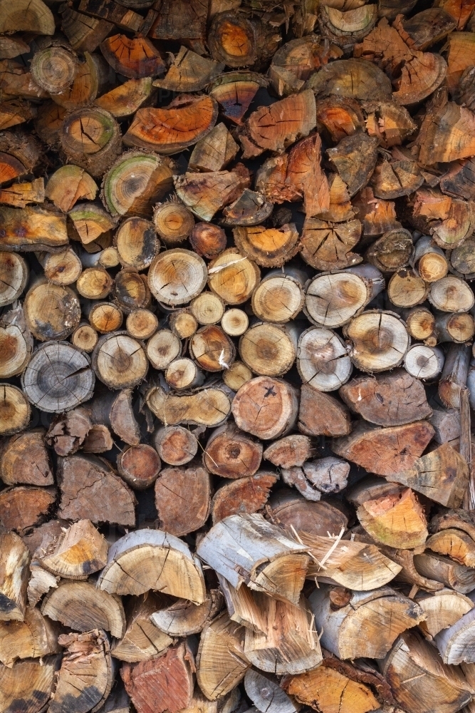 wood logs stacked ready to burn - Australian Stock Image