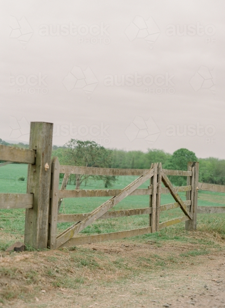 Wooden gate leading into paddock - Australian Stock Image